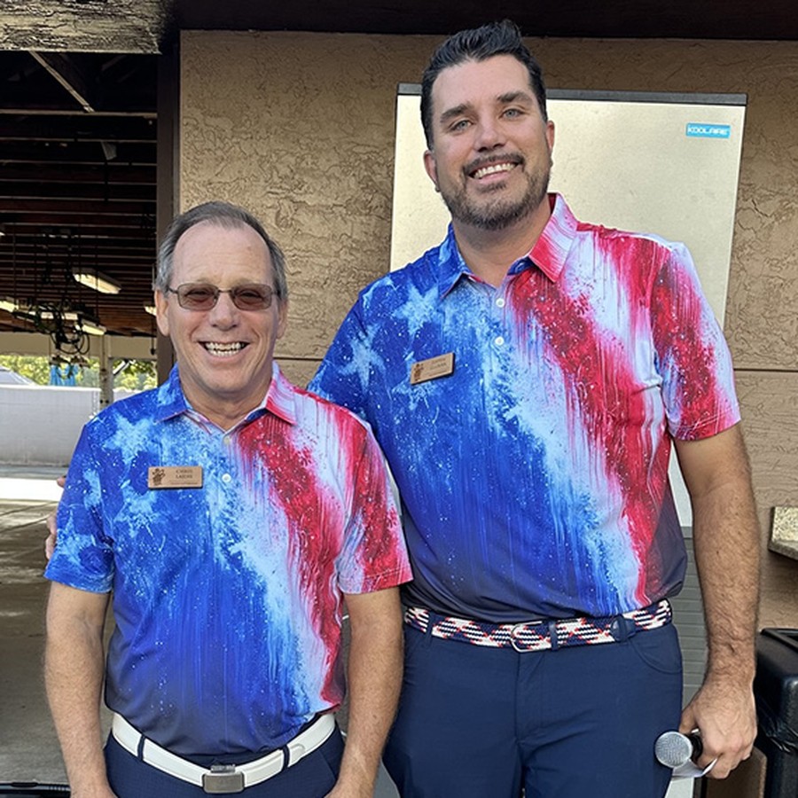 Chris Lajoie and Head Golf Professional Justin Glover in patriotic golf shirts